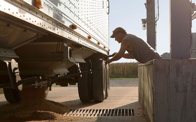 Man opening slider on semi.