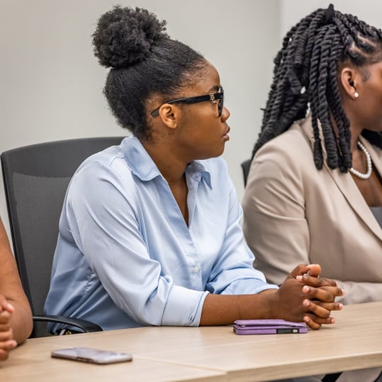 College student listens to Farm Credit Mid-America speaker