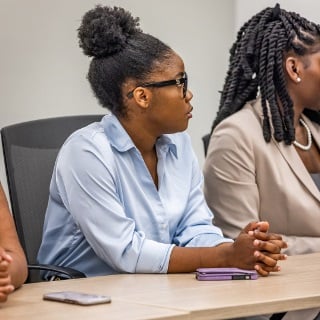 College student listens to Farm Credit Mid-America speaker