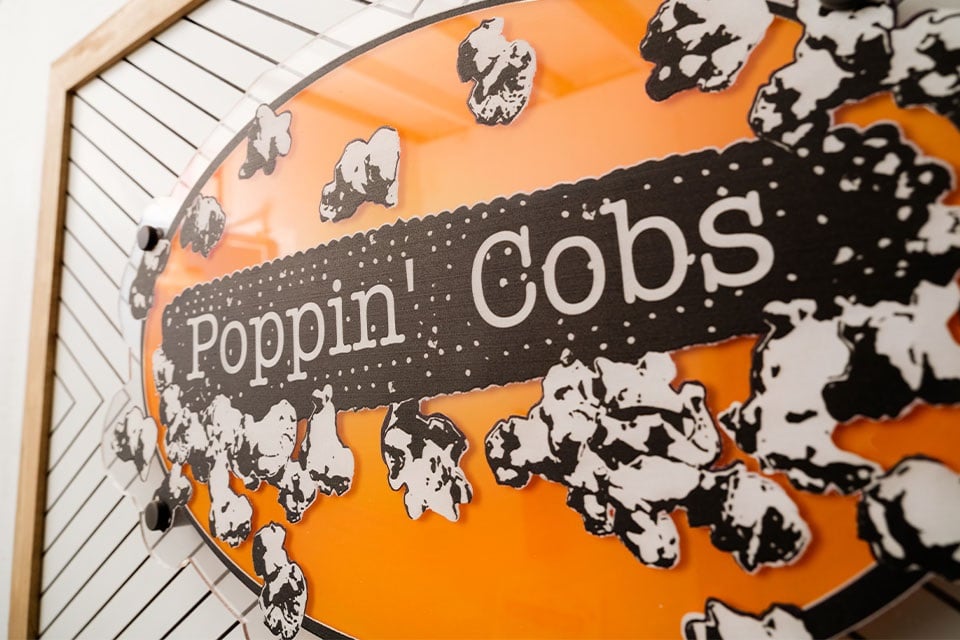 Poppin' Cobs logo sign taken by Farm Credit Mid-America freelancer