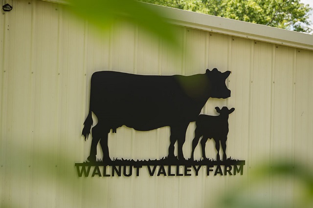 Farm sign of operation financed by Farm Credit Mid-America in rural Indiana.