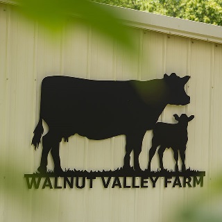 Farm sign of operation financed by Farm Credit Mid-America in rural Indiana.