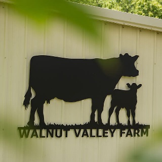 Farm sign of operation financed by Farm Credit Mid-America in rural Indiana.