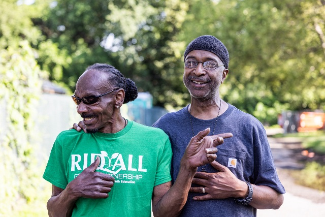 Two of the Rid-All founders stand together