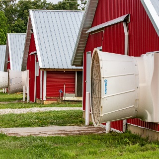 Red poultry barns financed by Farm Credit Mid-America