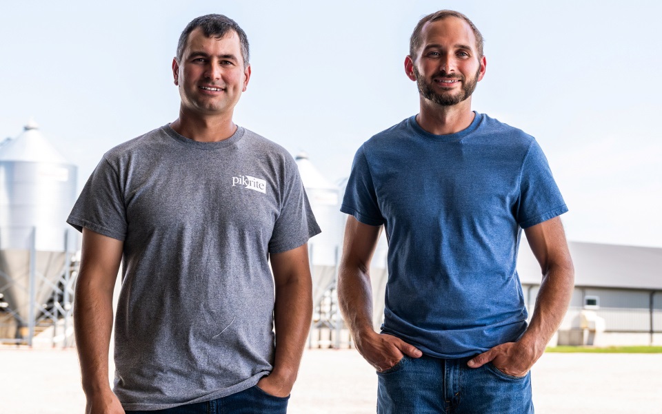 two hog farmers who finance with Farm Credit Mid-America