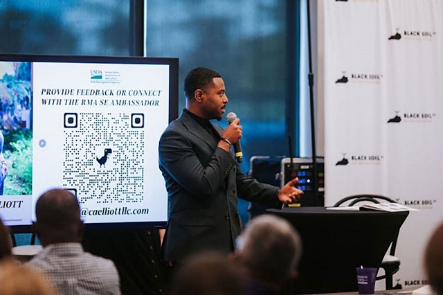 A man discusses Black Soil KY with an audience.